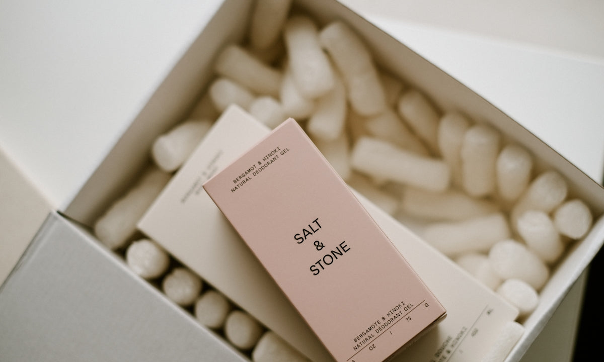 a box filled with white and pink marshmallows