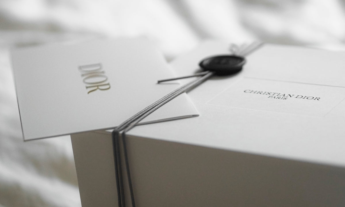 Dior gift box with ribbon and tag