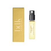 Cohorted The Electric Bloom Edit beauty box displayed on a cream pedestal, surrounded by purple and pink flowers in a botanical setting, beauty boxes, UK, Gift,    BDK Parfums Velvet Tonka Extrait