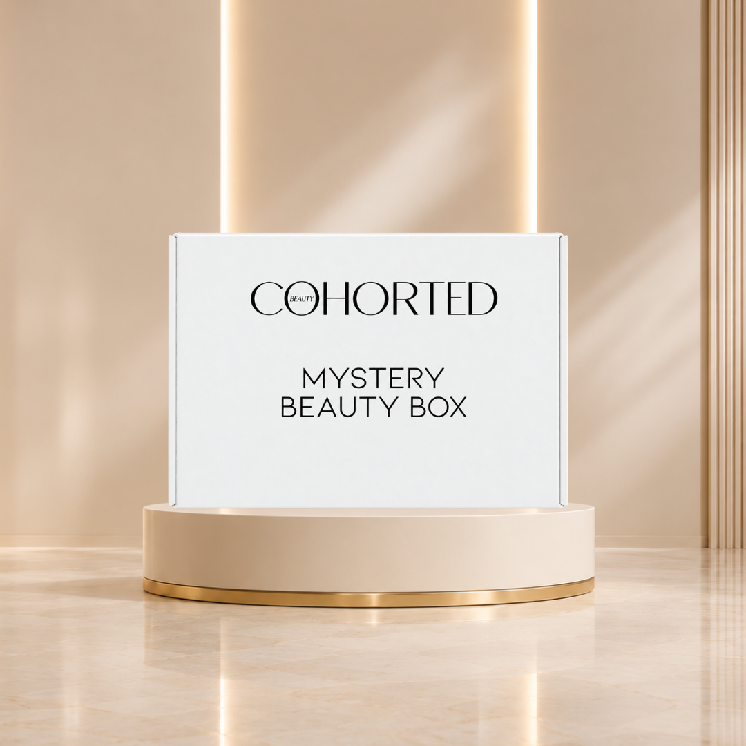 Cohorted First Edition Mystery Beauty Box featuring an elegant gift box with beauty products inside, from Be You Be Beautiful.