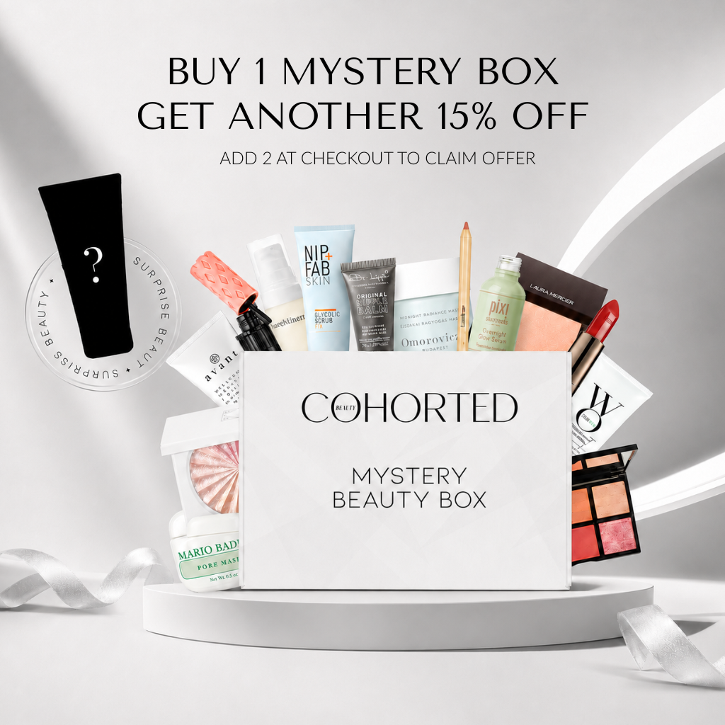 Cohorted Mystery Beauty Box First Edition with assorted skincare and makeup products in a gift beauty box.