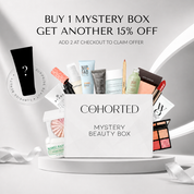 Cohorted Mystery Beauty Box First Edition with assorted skincare and makeup products in a gift beauty box.