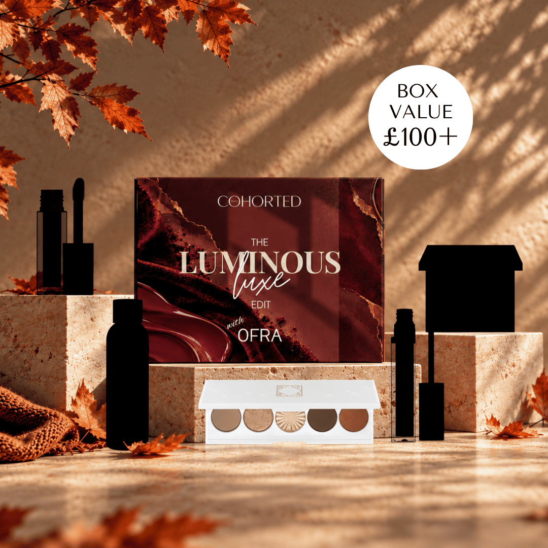 Cohorted Beauty luminous luxe subscription gift box featuring Ofra skincare and beauty products in elegant packaging.